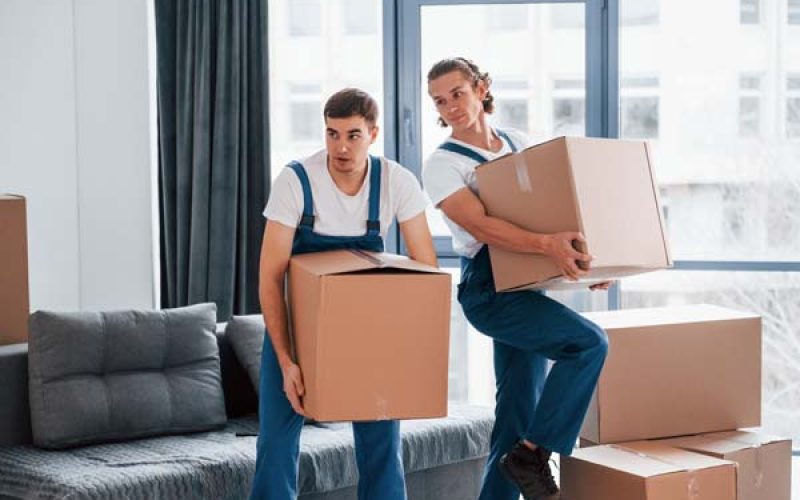 movers lift the packing with care
